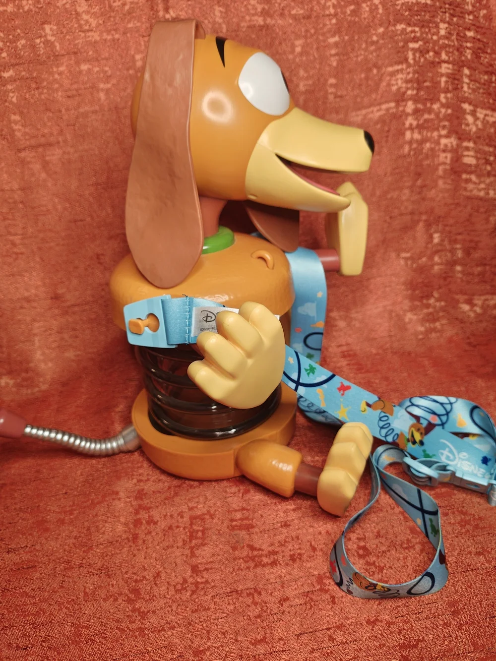 Disney Orange Slinky Dog Pop Corn Bucket, Sipper with Blue Character Lanyard